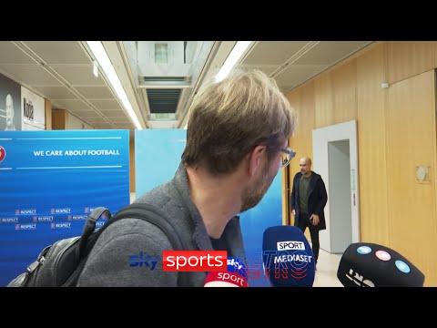 Jurgen Klopp runs away from Pep Guardiola